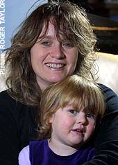 Saved by a friend: Sarah Darvill and her daughter, Isobel 